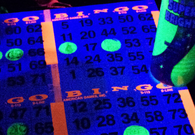 Bingo Card with dots under a black light